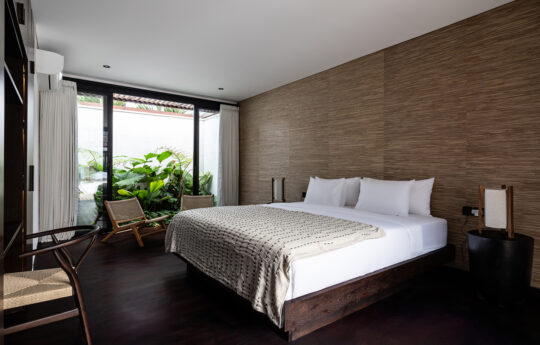 luxury bedroom of villa with king bed