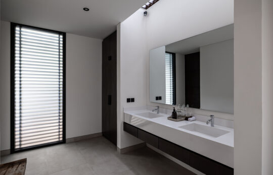 en suite bathroom of villa with twin vanities