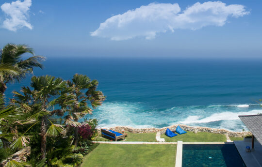 Ocean views from villa with swimming pool and garden glimpses