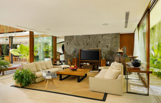 Comfortable living room with TV and sofas