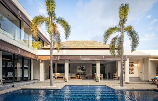 Villa Waha swimming pool and villa exterior during daytime