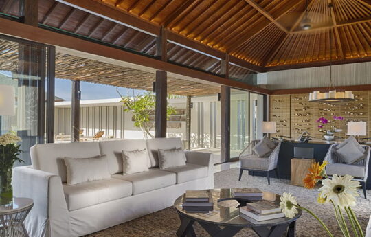 Modern interiors of villas with comfy lounge area with sofa