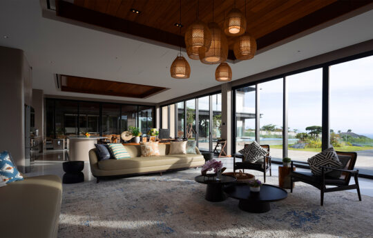 Palatial living and dining area with district views