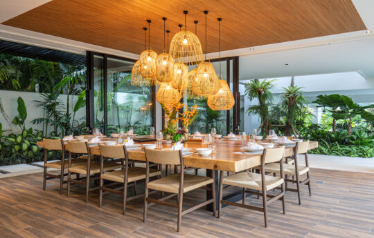 Huge wooden dining area that sits 12 people