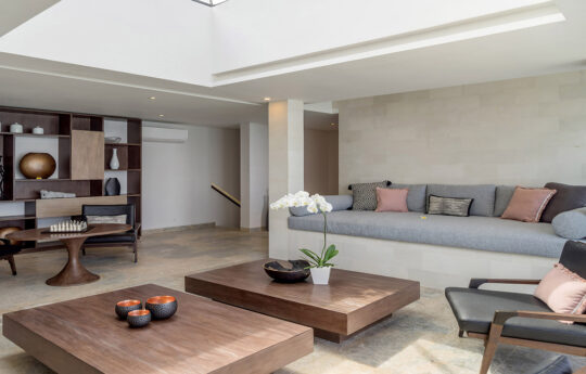 modern lounge room of villa with sofas and coffee table
