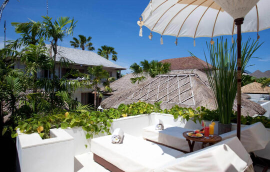 Rooftop gazebo area of villa with two day beds