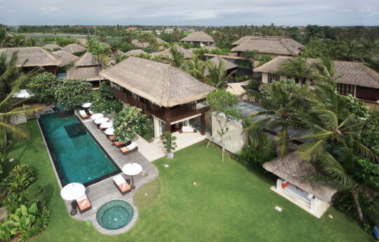 Villa Ambra from above with Canggu district and beach views