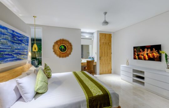 Modern bedroom at Villa Bamboo with TV