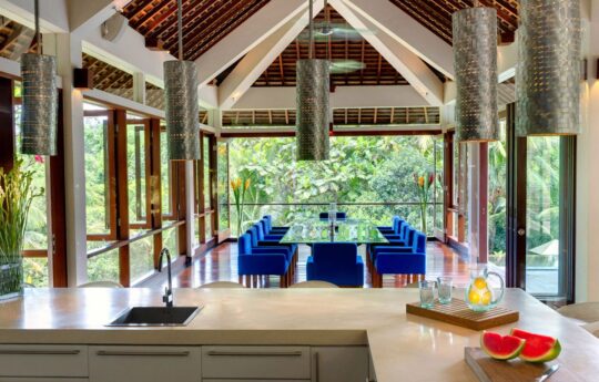 Dining area with jungle views of villa