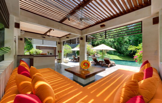 Lounge area with view to pool with coffee table