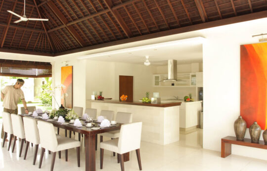 Balinese staff preparing dining table