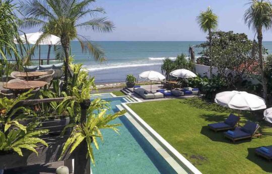 seminyak beach with swimming pool and garden views
