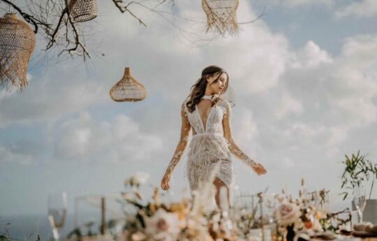 bride at wedding ceremony with flowers