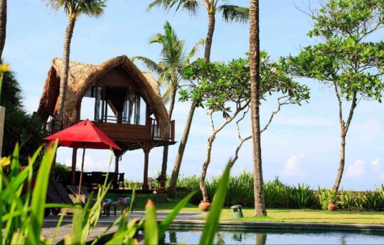 tree house for the kids next to swimming pool