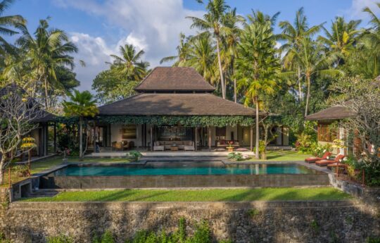 Villa Crystal Castle Villa Crystal Castle swimming pool and view of entire villa under Ubud sky