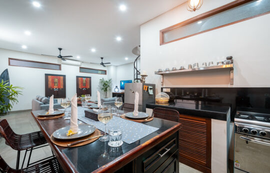 Villa kitchen and dining area with chairs