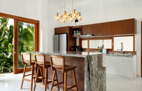 Modern kitchen with island bench and three stools