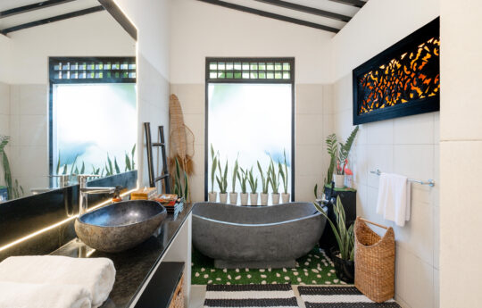 ensuite bathroom of villa with bathtub