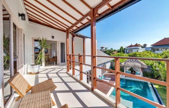 View from second floor of villa to pool and district