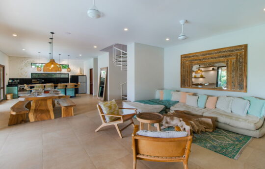 View of living and dining areas or tropical style villa with sofa
