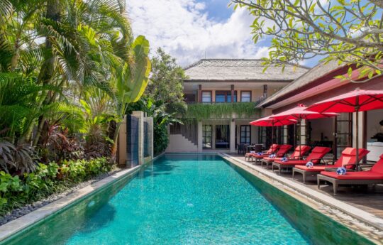 Villa_Nilaya_Seminyak Swimming pool, deck chairs and garden views of Villa Nilaya