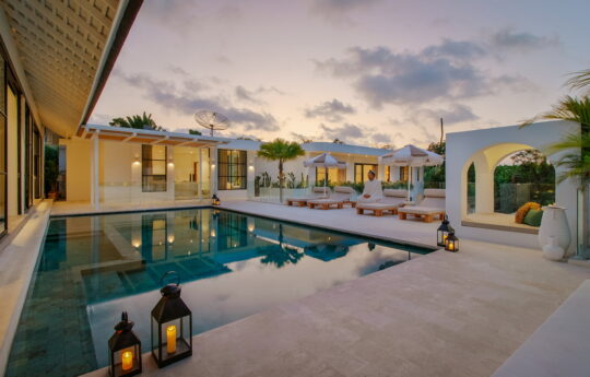 Villa Yang Villa Yang at sunset with swimming pool, pool deck and gazebo area