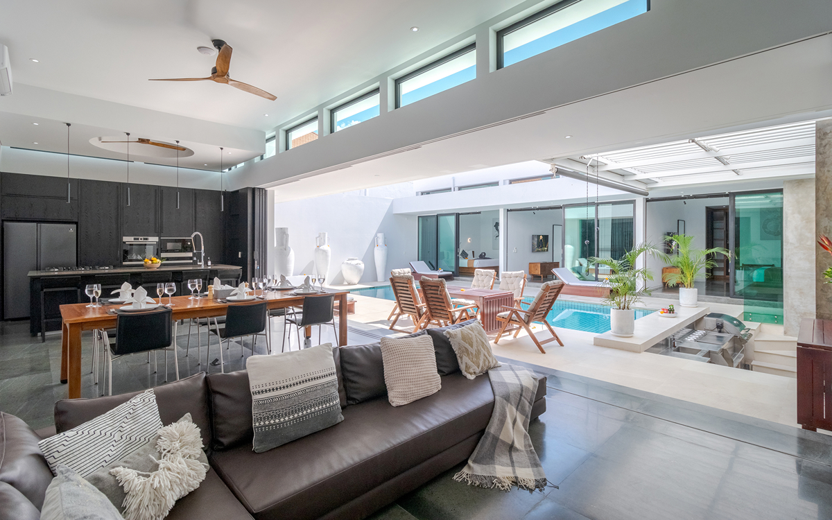 interiors of villa with view of pool and bedrooms