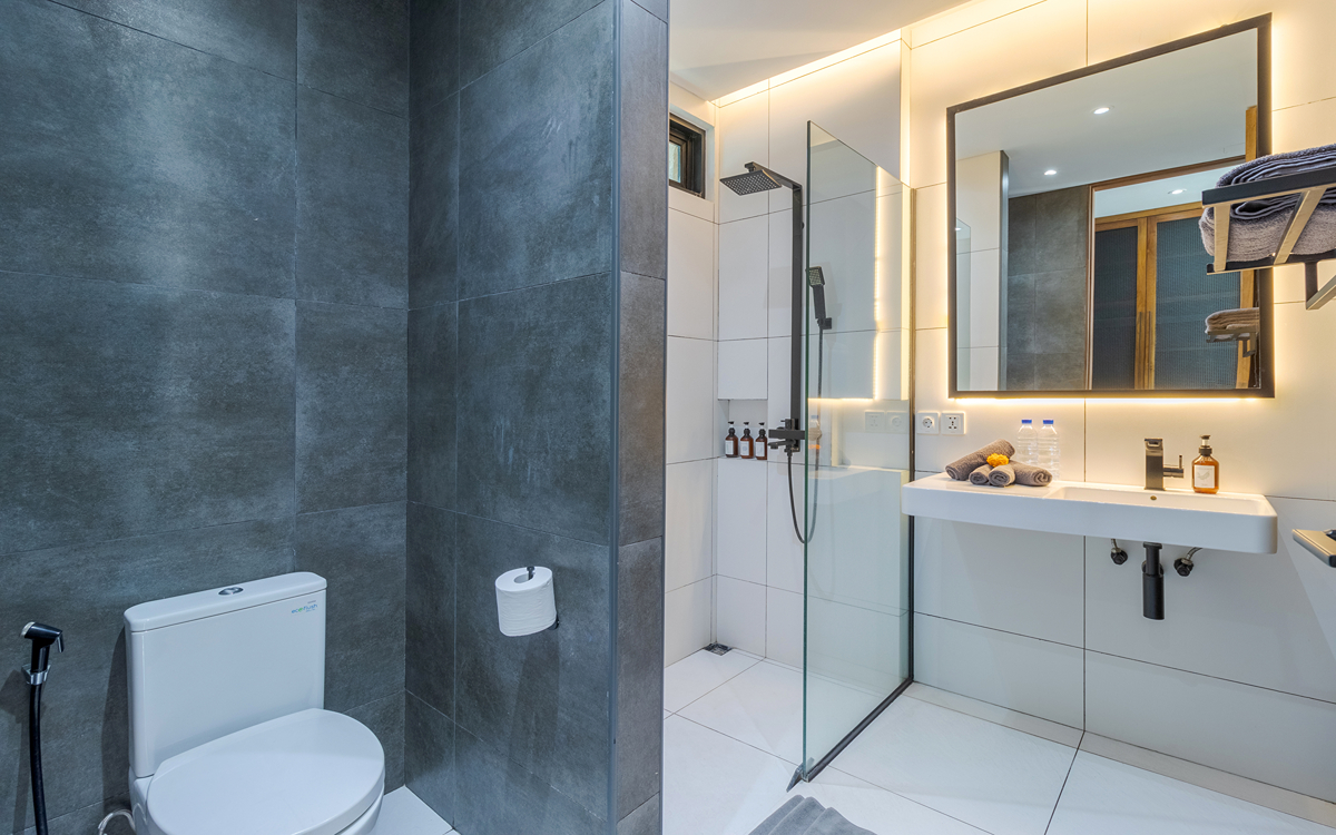 Modern ensuite bathroom of villa with toilet