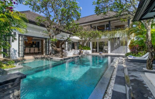 Vlla Senang Villa Senang's swimming pool views with garden and villa in background during daytime