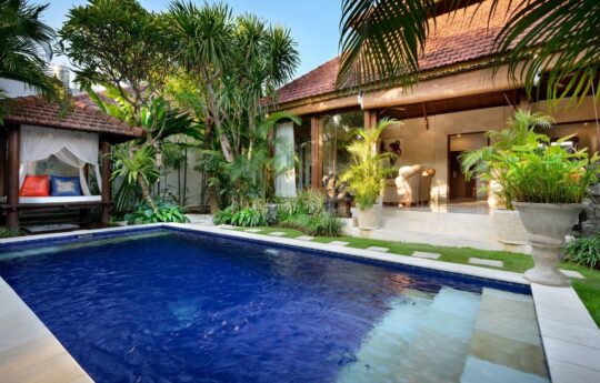 Villa Istana Satu Villa Istana Satu pool and daybeds in foreground with villa living areas