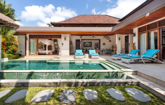Bali-style tropical villa with pool views and villa living areas