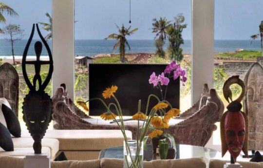 View to beach from outdoor living area of villa