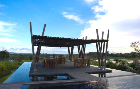 Second level of villa with gazebo area and views of rice fields and district views