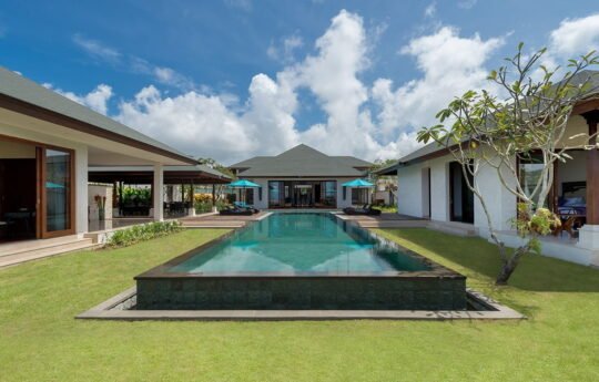 Swimming pool and villa exterior of villa marie in uluwatu