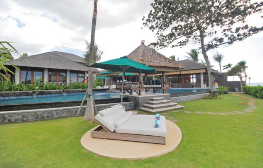 Villa Puri Awani – Sanur Bali Villas, grass area with day beds villa puri awani bali sanur villas