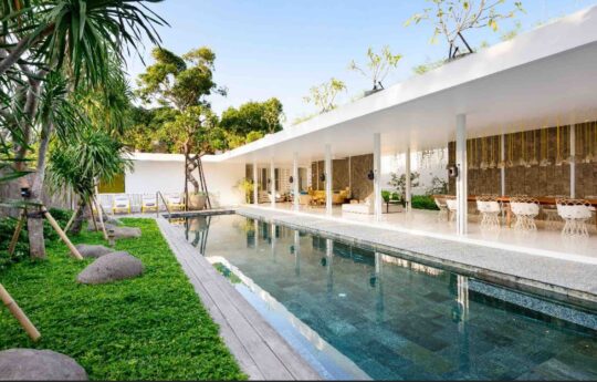 Villa 1880 Villa 1880 swimming pool, garden and living areas on sunny day