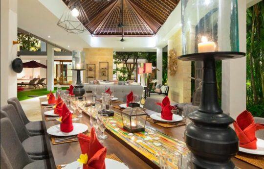 Dining table and villa interiors at night