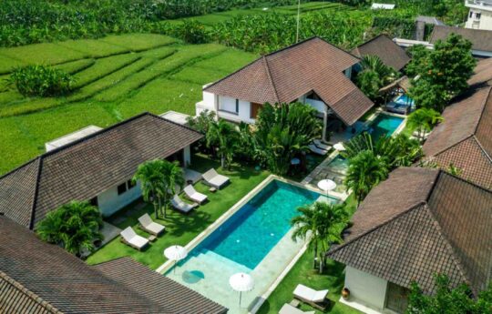 aerial view of large villa among the ricefields in Bali.