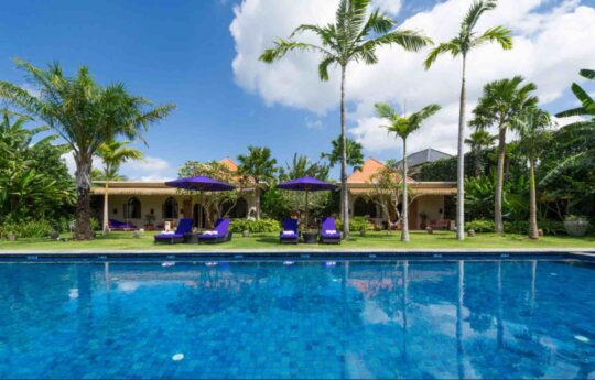 Villa Sayang D’Amour Pool views of Villa Sayang D'Amour with villa exteriors during sunny day