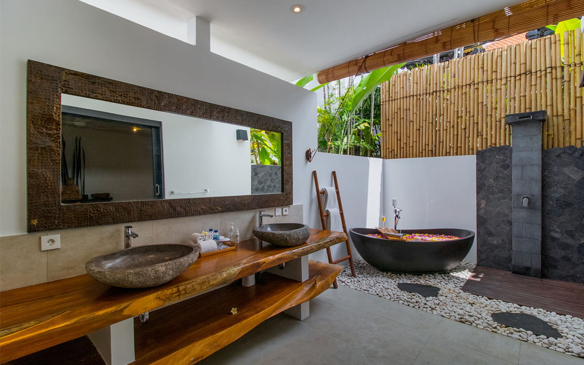 outdoor tropical ensuite bathroom with twin vanities