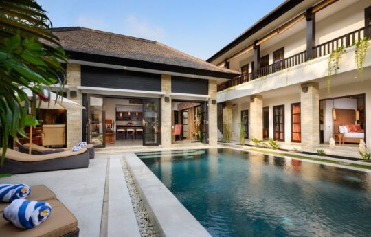 Villa Amman Villa Amman Swimming pool with villa exterior in background