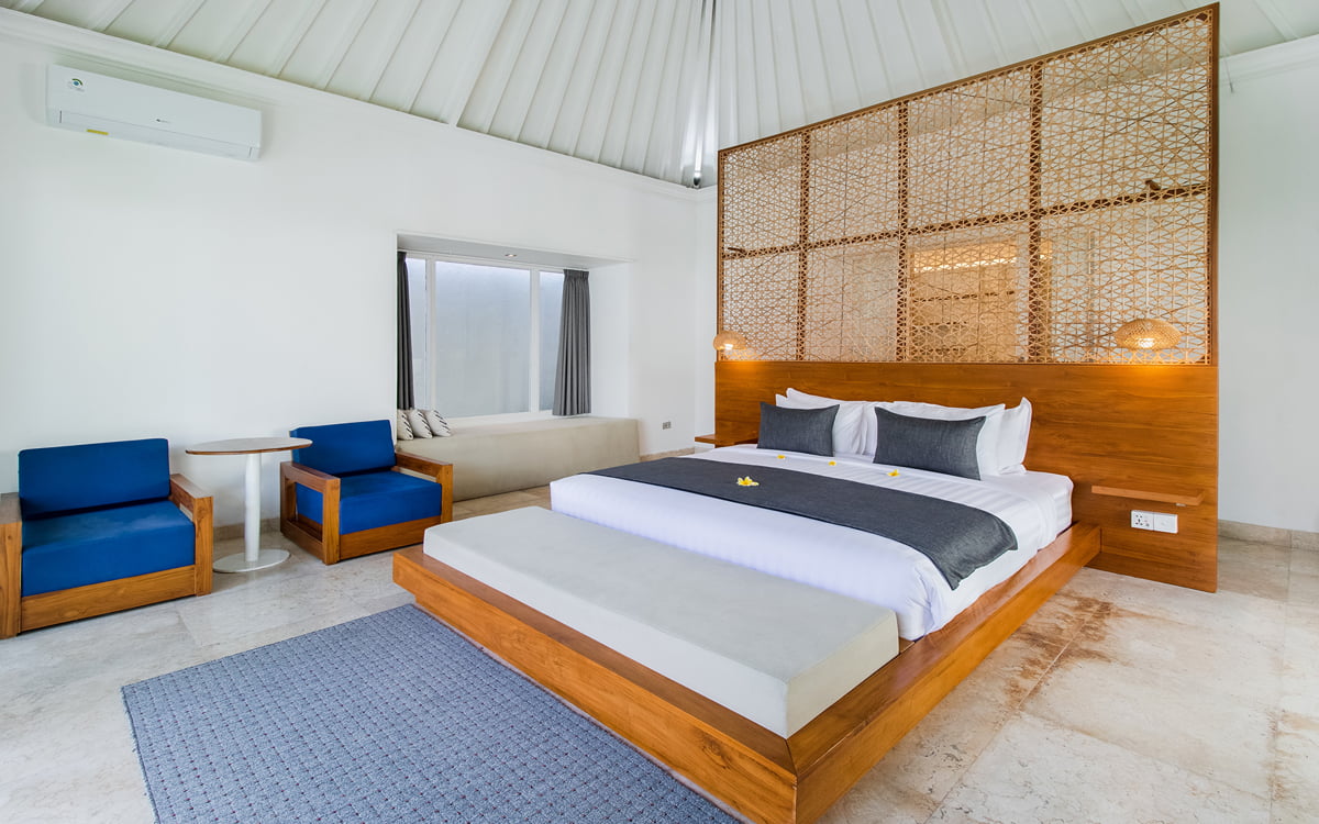 Modern bedroom with king bed and A/C