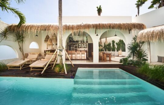 Villa Bondi Swimming pool views with outlook of villa interiors during day