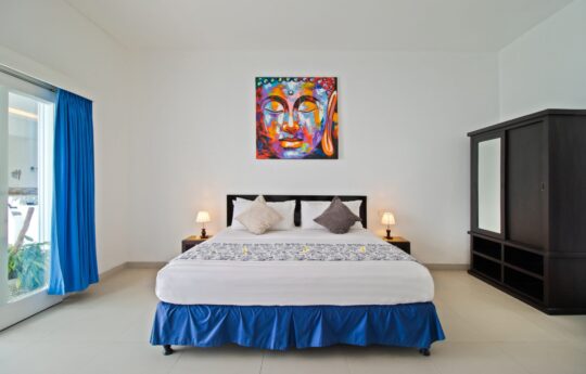 Modern bedroom of villa with king bed
