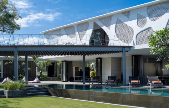 Villa facade with pool and deck area