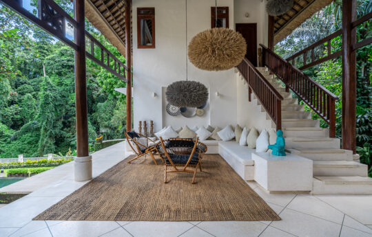 lounge area with sofa and view of garden