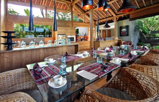 Umalas villas – villa kalua, dining area with kitchen in back ground villa kalua umalas villas