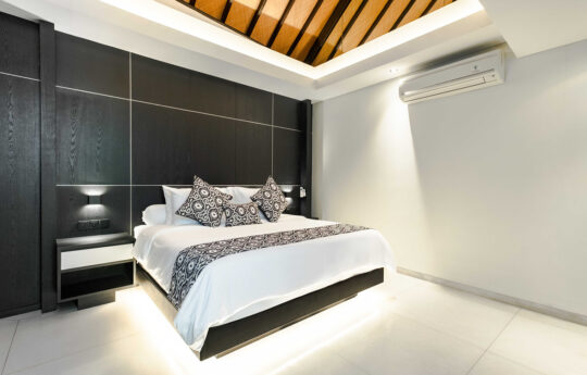 Modern bedroom with air conditioning and king bed