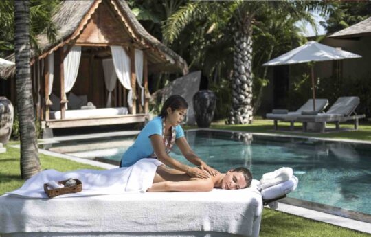 villa tiga puluh Women getting massage by the pool at Villa Tiga Puluh