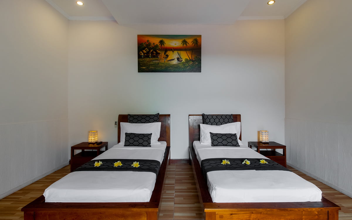 Two single beds in bedroom